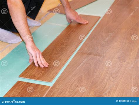 Laying laminate flooring stock image. Image of laying - 17331739