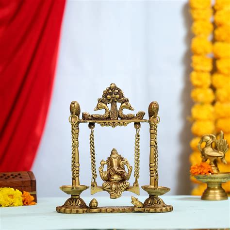 Buy Handcrafted 9" Brass Ganesha Swing Idol with Diyas – Ethnic India ...