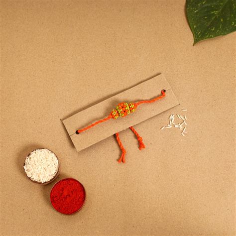 Buy Handmade Flower Rakhi & Beadwork Rakhi