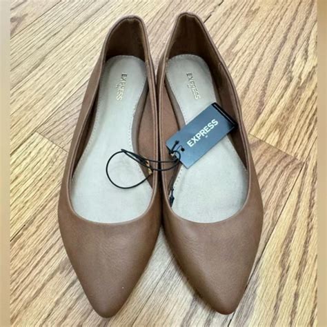 Women’s brown pointed toe flats from Express, never... - Depop