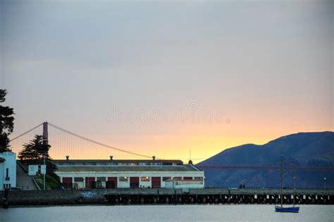 San Francisco Bay Sunset with Bridge and Waterfront Architecture Stock ...