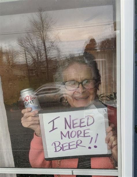 Woman Who Went Viral For Holding Up A 'I Need Beer Sign' Gets Her Wish ...
