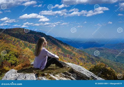Woman Relaxing on Autumn Hiking Trip. Stock Image - Image of blue ...