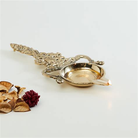Buy Upasana Metal Spoon Diya from Home Centre at just INR 1299.0