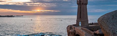 Download wallpaper sea, sunrise, stones, dawn, France, lighthouse ...