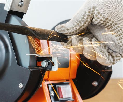 Expert tips for how to sharpen lawn mower blades safely | Homes and Gardens