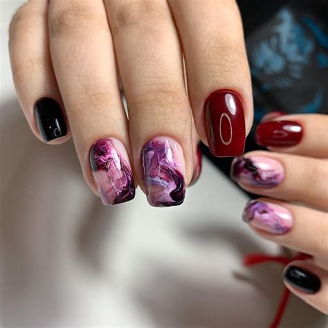 https://www.hairstylery.com/wp-content/uploads/images/30-short-square-burgundy-marble-nails.jpg