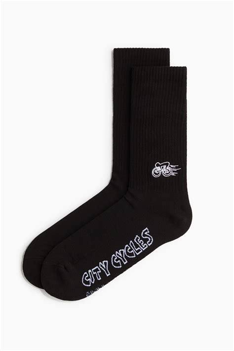 Motif-detail socks - Black/Keith Haring - Men | H&M IN