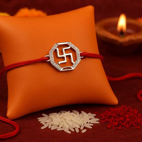 Zarkan Swastik Pure Silver Elegant Rakhi With Roli Chawal