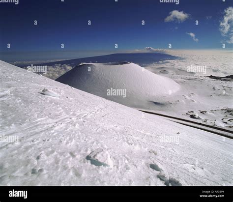 Snow capped Mauna Kea with mauna Loa in background Island of Hawaii ...