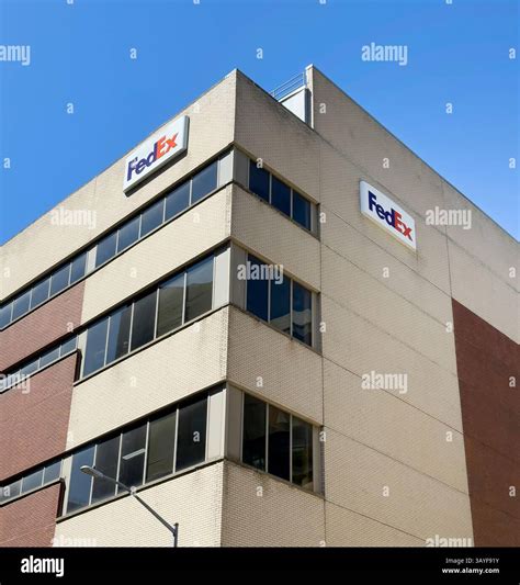 FedEx shipping center, building exterior with logo sign, New York City ...