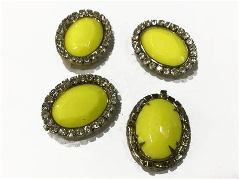 Yellow Oval Plastic Stone with Crystal Frame (28x30 mm)