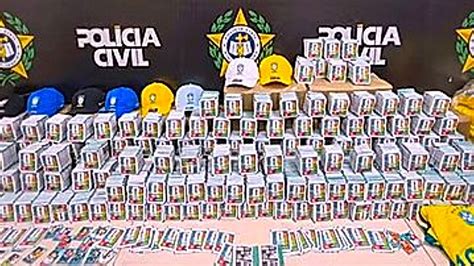Police uncover 200,000 fake World Cup stickers hidden inside bus in Brazil