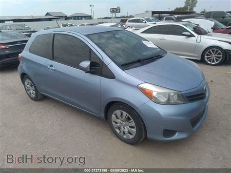 Report JTDJTUD38ED575311 TOYOTA YARIS 2014 Blue Gasoline - price and damage history