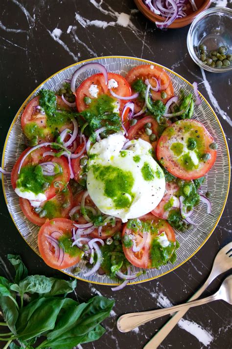 Tomato burrata salad with basil and garlic dressing