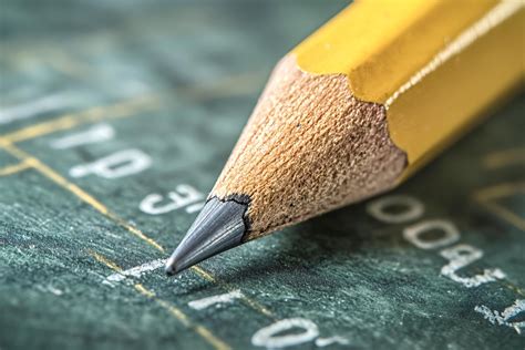 Short graphite pencil pointing numbers on green chart 55303455 Stock ...