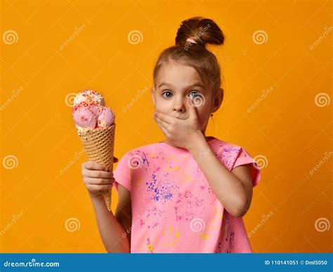 Pretty Baby Girl Kid Eating Licking Banana and Strawberry Ice Cream in ...