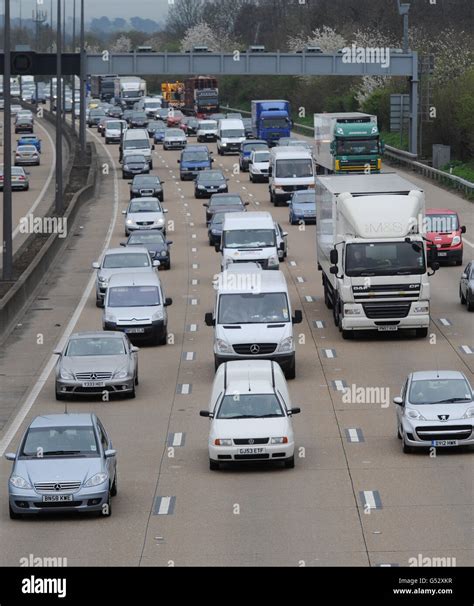 Traffic builds up on the M25 in Surrey today as commuters start the ...
