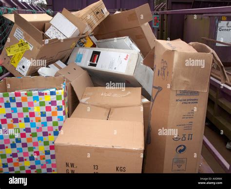 piles of cardboard boxes piled up for recycling at recycling depot ...