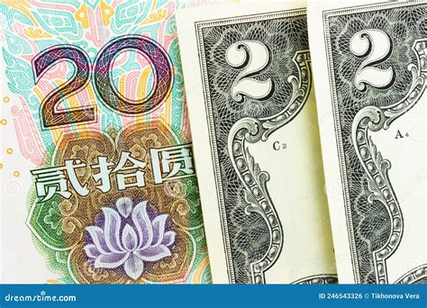 Money Background from Yuan Banknote and Us Dollar Bills Stock Photo ...