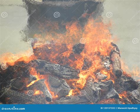 Funeral Pyre with Fire Wood and Flames at Cremation Grounds Stock Image ...