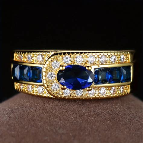 Vintage gold ring with zirconia and blue stones – Claire Jewelry