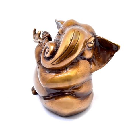 Buy Murli Ganesha Showpiece - Golden Brass Showpiece Online at Best Price