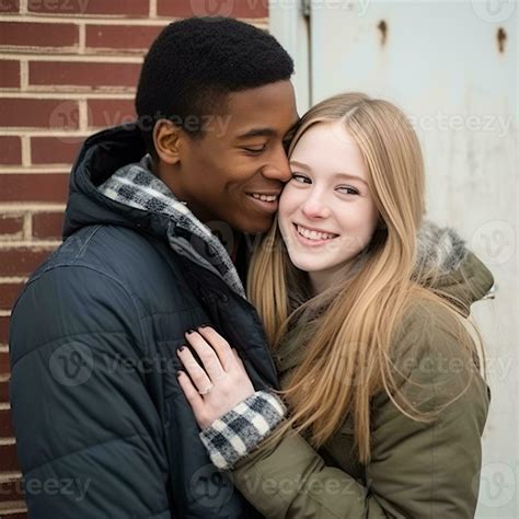 Loving teenage interracial couple is enjoying a romantic winter day AI ...