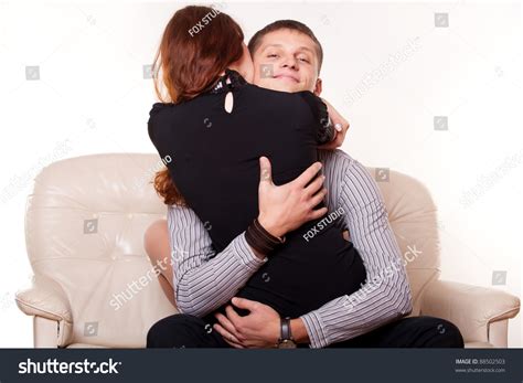Young Man Embraces Woman Who Sitting Stock Photo 88502503 - Shutterstock