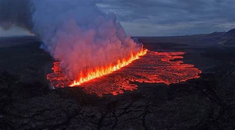 Southwestern Iceland volcano erupts, prompting evacuation of campsite ...