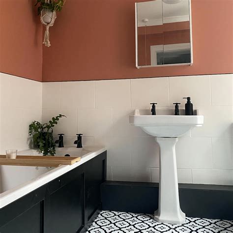 This dull magnolia bathroom was given a bold terracotta makeover ...