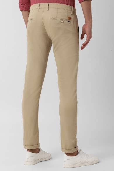 Buy Men Beige Solid Low Skinny Fit Chino Casual Trousers Online ...
