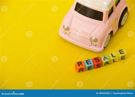 Photos Featuring Toy Cars with Miniature Dollar Bills, Symbolizing the Potential Profits in the ...