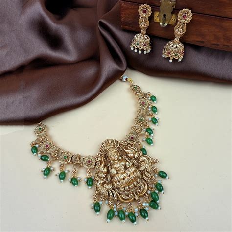 Antique Gold Plated Temple Necklace with Goddess Lakshmi Pendant and J ...