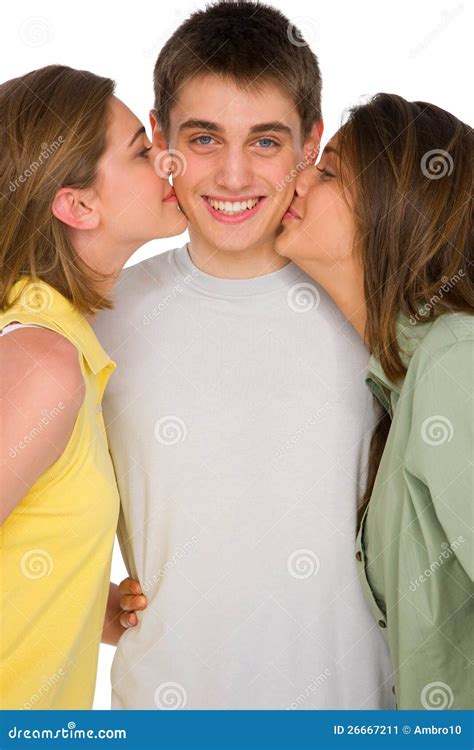 Teenage Girls Kissing Teenage Boy Stock Image - Image of girls, looking ...