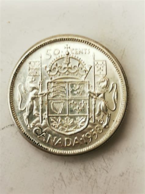 1958 SILVER 50 CENT PIECE