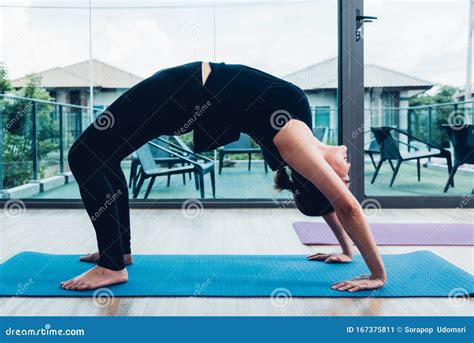Young Woman Doing Bridge Pose Yoga Stock Image - Image of backbend, adult: 167375811