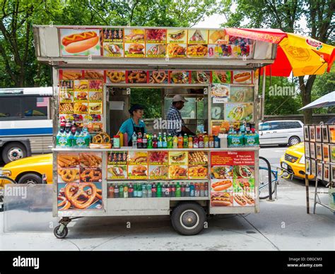 Traditional New York street food van truck stand, New York City, selling hot dogs, burgers ...
