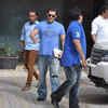 Salman Khan waves to the shutterbugs while leaving the building.
