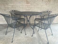Image result for Wrought Iron Outdoor Table and Chairs with Umbrella