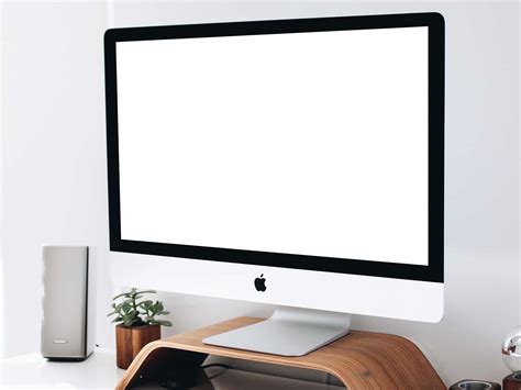 iMac on Wooden Monitor Stand Mockup – The Mockup Club