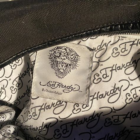 Vintage black Ed Hardy bag/purse, the inside has a... - Depop