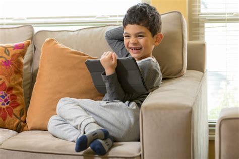 Barefoot Child Using Computer 的图像结果