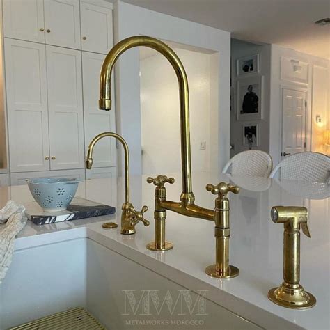 Aged Brass Kitchen Faucet With Gooseneck Spout