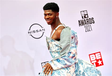 Lil Nas X 'Pregnancy'-Themed Album Photo Shoot Polarizes Fans | Us Weekly