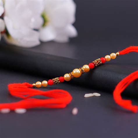 Send Adorable Pearl Rakhi Online | Rakhibazaar.com