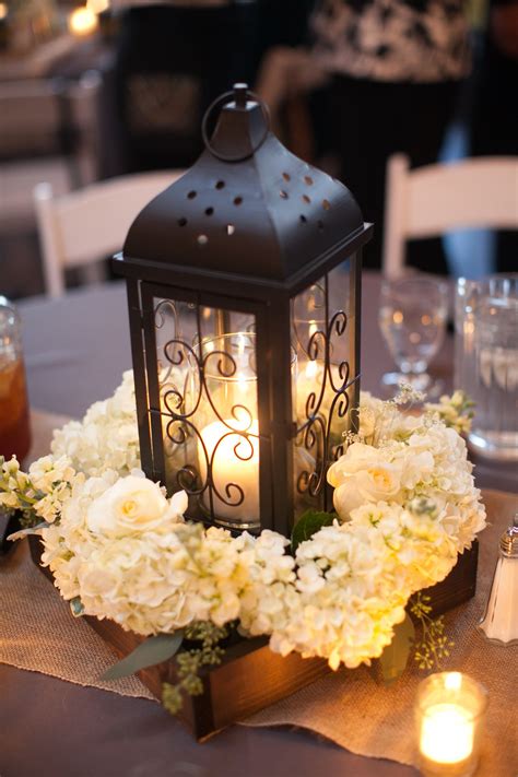 Black Lantern and White Hydrangea Centerpiece | Lantern decor wedding ...