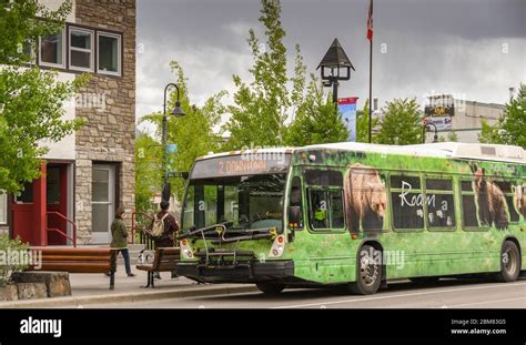 BANFF, AB, CANADA - JUNE 2018: Public service bus in downtown Banff ...