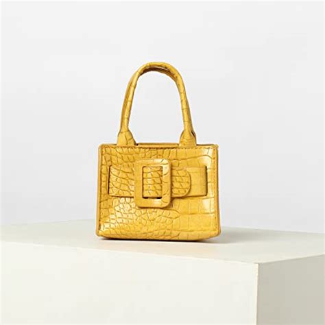 Buy Haute Sauce Women yellow bucket handbag (HSHB1200) at Amazon.in