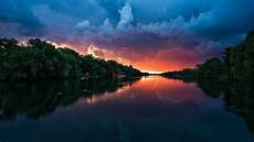 Desktop Wallpaper by Sunset Peaceful River Coast With Green Trees Forest Desktop Wallpaper